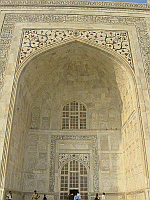 Exquisite engraving on the walls of the Taj Mahal